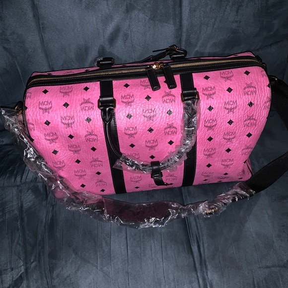 pink mcm duffle bag